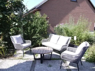 Ein Garten an der Unterkunft Ferienhaus Haffliebe