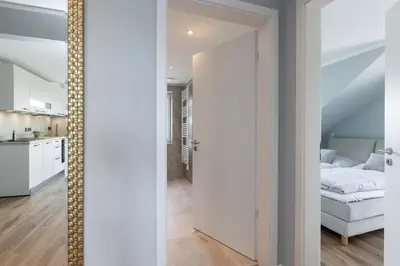 Ein Bett oder Betten in einem Zimmer der Unterkunft Sturmfrei Galerie 1