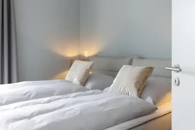 Ein Bett oder Betten in einem Zimmer der Unterkunft Sturmfrei Suite 5