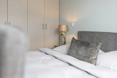 Ein Bett oder Betten in einem Zimmer der Unterkunft Sturmfrei Studio 2