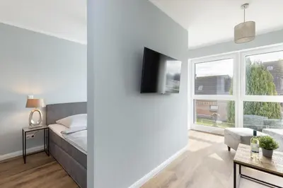 Ein Bett oder Betten in einem Zimmer der Unterkunft Sturmfrei Studio 2