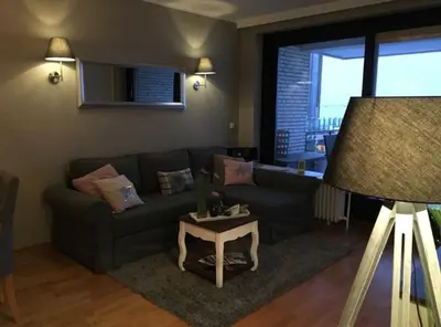 Ein Sitzbereich in der Unterkunft StrandSUITE Scharbeutz