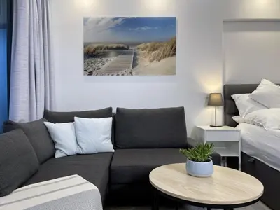 Ein Bett oder Betten in einem Zimmer der Unterkunft Maritim Residenz 6 - Sea Lounge
