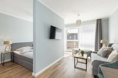 Ein Bett oder Betten in einem Zimmer der Unterkunft Sturmfrei Studio 1