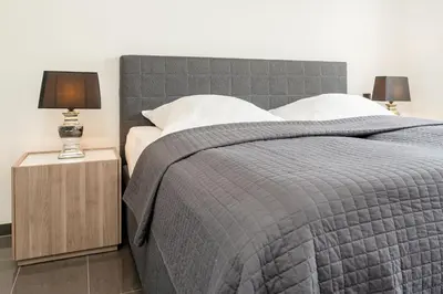 Ein Bett oder Betten in einem Zimmer der Unterkunft Strandvilla Augustusbad Meerverliebt