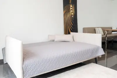 Ein Bett oder Betten in einem Zimmer der Unterkunft Strandvilla Augustusbad Meerverliebt