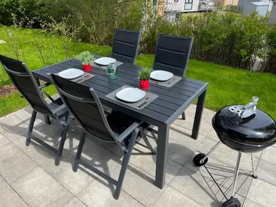 Ein Garten an der Unterkunft Ostseecamp Ferienhaus 