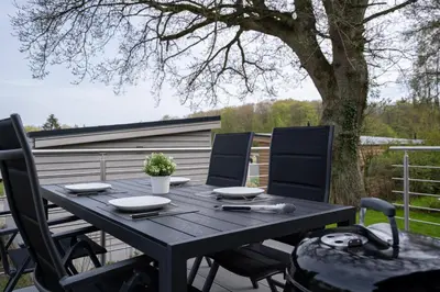 Ein Balkon oder eine Terrasse in der Unterkunft Ostseecamp Ferienhaus 