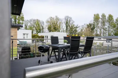 Ein Balkon oder eine Terrasse in der Unterkunft Ostseecamp Ferienhaus 