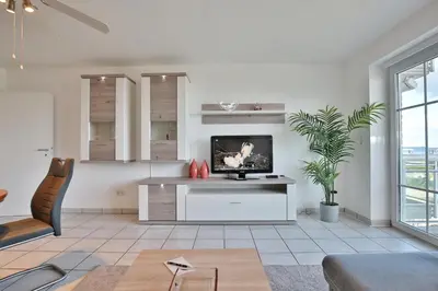 Ein Sitzbereich in der Unterkunft Stranddomizil Stranddomizil Appartement 7