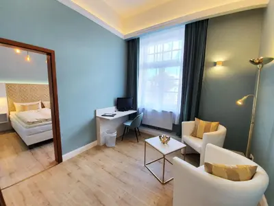 Ein Bett oder Betten in einem Zimmer der Unterkunft Hotel Atlantic Travemünde