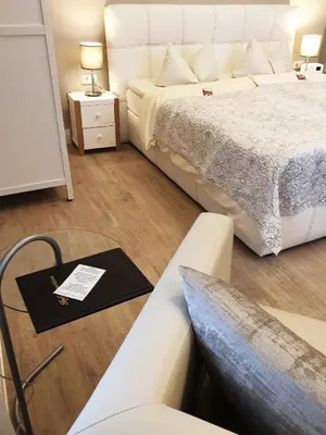 Ein Bett oder Betten in einem Zimmer der Unterkunft Hotel Atlantic Travemünde