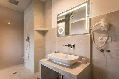 Ein Badezimmer in der Unterkunft Hotel Atlantic Travemünde