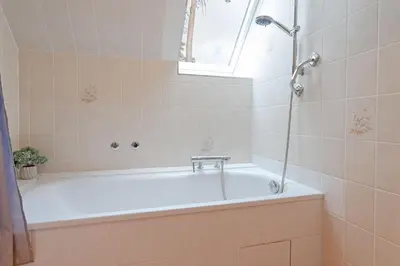 Ein Badezimmer in der Unterkunft Haus Eva Mar am Meer Appartement 4