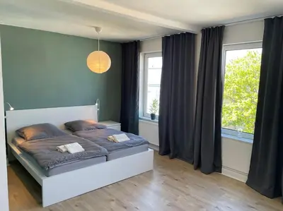 Ein Bett oder Betten in einem Zimmer der Unterkunft Ferienwohnung Hansezauber Lübeck