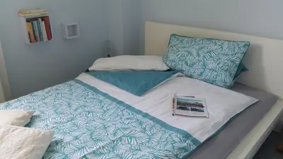 Ein Bett oder Betten in einem Zimmer der Unterkunft BED & BREAKFAST für Individualisten in Gemeinde Scharbeutz, auch Allergiker