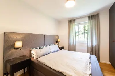 Ein Bett oder Betten in einem Zimmer der Unterkunft Ferienwohnung Infinity Garden - Scharbeutz