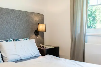 Ein Bett oder Betten in einem Zimmer der Unterkunft Ferienwohnung Infinity Garden - Scharbeutz