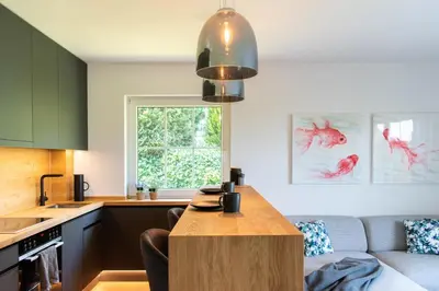 Küche/Küchenzeile in der Unterkunft Ferienwohnung Infinity Garden - Scharbeutz