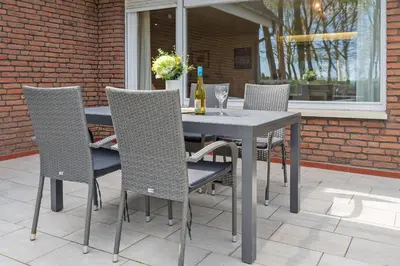 Ein Patio oder anderer Außenbereich in der Unterkunft Haus Eva Mar am Meer Appartement 1