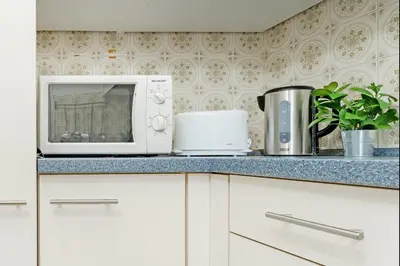 Küche/Küchenzeile in der Unterkunft Haus Eva Mar am Meer Appartement 1