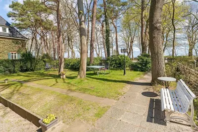 Ein Garten an der Unterkunft Haus Eva Mar am Meer Appartement 5