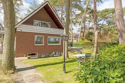 Ein Garten an der Unterkunft Haus Eva Mar am Meer Appartement 5