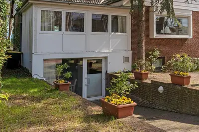 Ein Garten an der Unterkunft Haus Eva Mar am Meer Appartement 5