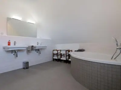 Ein Badezimmer in der Unterkunft Kapitänshaus