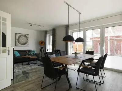 Ein Sitzbereich in der Unterkunft Kapitänshaus