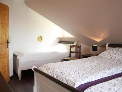 Ein Bett oder Betten in einem Zimmer der Unterkunft Sonnenblick Ferienhaus