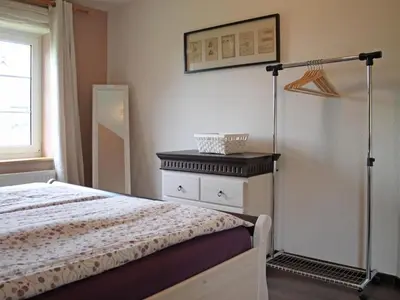 Ein Bett oder Betten in einem Zimmer der Unterkunft Sonnenblick Ferienhaus