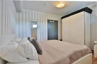 Ein Bett oder Betten in einem Zimmer der Unterkunft Haus Bergstraße 35 Appartement 16