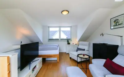Ein Sitzbereich in der Unterkunft Ferienwohnung Strandgefühl - Timmendorfer Strand