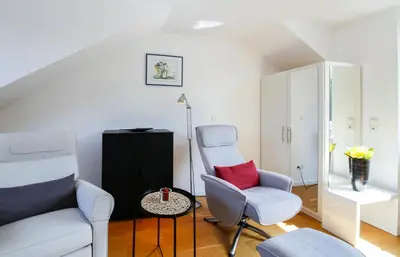 Ein Sitzbereich in der Unterkunft Ferienwohnung Strandgefühl - Timmendorfer Strand