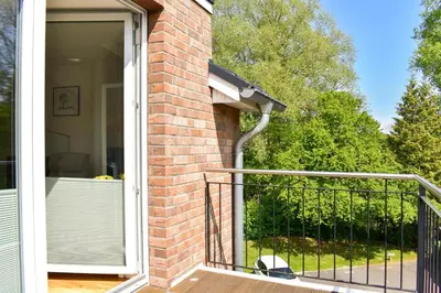 Ein Balkon oder eine Terrasse in der Unterkunft Ferienwohnung Strandgefühl - Timmendorfer Strand