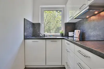 Küche/Küchenzeile in der Unterkunft Im Brook 28 Appartement 2 Kleine Idylle