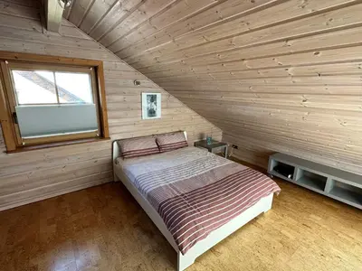 Ein Bett oder Betten in einem Zimmer der Unterkunft FeWo Wardersee