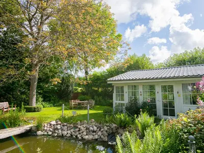 Ein Garten an der Unterkunft Lieblingsort fröhlichkeit