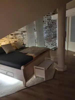 Ein Bett oder Betten in einem Zimmer der Unterkunft Das Haus am Kanal.