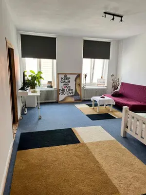 Ein Sitzbereich in der Unterkunft City Apartment