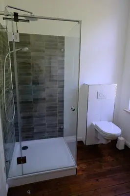 Ein Badezimmer in der Unterkunft Gutshaus KVH FeWo Priwall