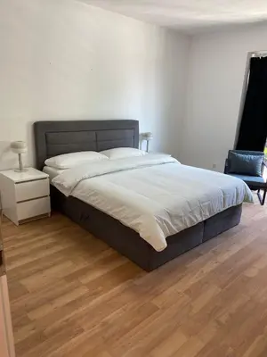 Ein Bett oder Betten in einem Zimmer der Unterkunft Hansehaus Lübeck - Stadtnest