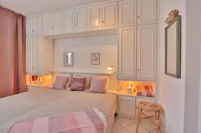Ein Bett oder Betten in einem Zimmer der Unterkunft Berliner Hof Berliner Hof Appartement 510