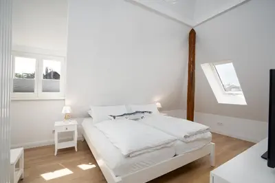 Ein Bett oder Betten in einem Zimmer der Unterkunft KUR18 Ferienwohnung Baltic Deck