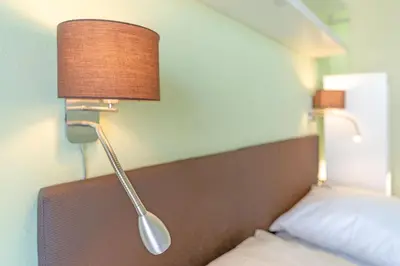 Ein Bett oder Betten in einem Zimmer der Unterkunft Panoramic Panoramablick Ostsee