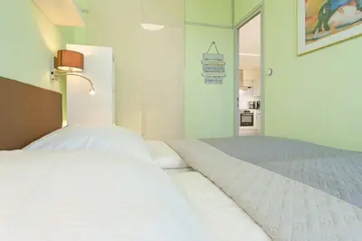 Ein Bett oder Betten in einem Zimmer der Unterkunft Panoramic Panoramablick Ostsee