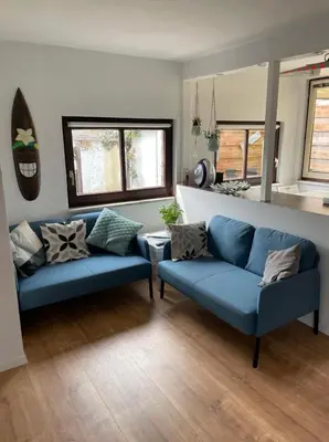 Ein Sitzbereich in der Unterkunft Haffkrug Beach Bungalow