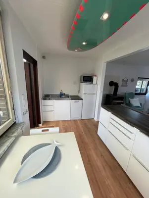 Küche/Küchenzeile in der Unterkunft Haffkrug Beach Bungalow