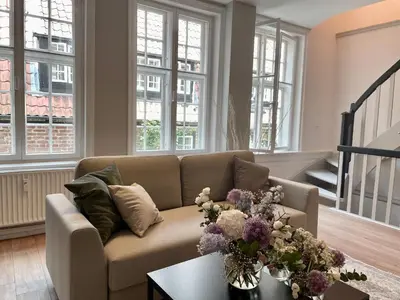 Ein Sitzbereich in der Unterkunft Ferienwohnung Marzipan - im Herzen der Altstadt, historisches Gebäude mit modernem Ambiente, W-LAN